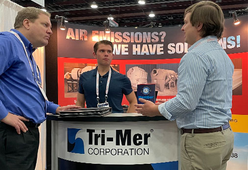 Tri-Mer Employee discussing air pollution issues at SUR/FIN conference